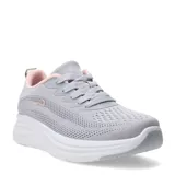 Championes deportivos de tejido de punto en color gris con detalles en rosado, cuentan con suela blanca de plataforma y cierre mediante cordones.