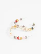 Aros de argolla con mostacillas de colores.