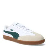 Championes Puma 9T blancos con detalles en verde y suela marrón.