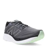Championes de running New Balance modelo 680 v8, confeccionados en tejido knit transpirable color gris. Presentan mediasuela con tecnología Fresh Foam para mayor amortiguación, suela de goma con detalles en verde menta y el logo característico de la marca en los laterales.