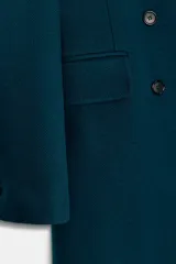 Abrigo entallado de Zara confeccionado en mezcla de lana, con diseño de doble botonadura, cuello solapa de muescas, hombreras y bolsillos delanteros con solapa.
