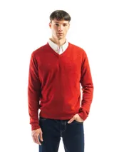 Buzo tejido de punto con cuello en V, de calce regular y mangas largas con puños acanalados.