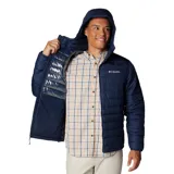 Campera puffer Columbia modelo Powder Lite II, color azul marino, con capucha integrada, cierre frontal completo y bolsillos laterales con cremallera. Cuenta con tecnología Omni-Heat™ termorreflectante y aislamiento sintético Thermarator™.