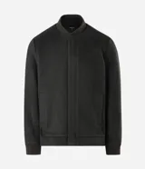 Campera bomber Marfinno para hombre, de color verde oscuro, confeccionada en tejido polyvelour de poliéster con textura aterciopelada. Presenta cuello, puños y dobladillo en ribana elástica, cierre frontal oculto y bolsillos laterales ribeteados.