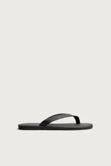 Sandalias estilo ojota para hombre, de color negro, con diseño plano y tiras anchas en el empeine.