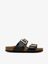 Sandalias de cuero sintético negro con hebillas doradas ajustables y plantilla de corcho.