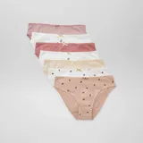 Pack de siete bombachas de algodón con diseños variados, incluyendo estampados de vaquitas de San Antonio, flores y colores lisos, todas con un pequeño lazo decorativo en la cintura.