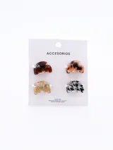 Set de cuatro pinzas pequeñas para el pelo con diseño de mandíbula. Cada pinza tiene un color y patrón diferente: marrón claro, marrón oscuro, gris con patrón pata de gallo y beige con textura de madera.
