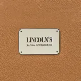 Billetera larga con cierre perimetral, confeccionada en material sintético texturizado color mostaza. Cuenta con correa de mano extraíble y placa metálica con logo de la marca en el frente.