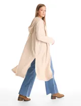 Cardigan largo tipo duster de la marca Dictionary, color beige, con capucha, frente abierto, manga larga y bolsillos laterales.