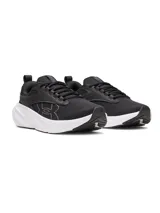 Championes Under Armour modelo W Surge 5, color negro con suela blanca, confeccionados con malla transpirable y entresuela de amortiguación.