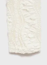 Top de tejido de punto calado con cuello perkins y manga larga, de diseño entallado.