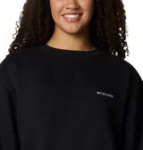 Buzo de cuello redondo negro Columbia con calce oversize, confeccionado en mezcla suave de algodón. Presenta costillas en puños y dobladillo, y el logo de la marca bordado en pequeño en el pecho.