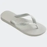 Ojotas Havaianas modelo Top, de diseño clásico con tiras anchas y suela de goma con textura antideslizante.