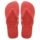 Ojotas Havaianas modelo Top, color gris oscuro con tiras plateadas metálicas con relieve.