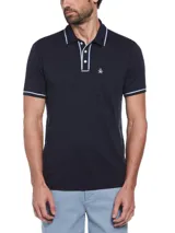 Polo azul marino de manga corta en tejido interlock, con cuello clásico, tapeta con botones, bolsillo en el pecho y logo bordado. Detalles de ribete blanco en cuello y mangas.