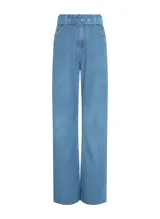 Pantalón de jean celeste de corte palazzo, tiro alto, con trabillas y cinturón de tela a juego con hebilla forrada.