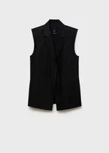 Chaleco tipo blazer sin mangas, de corte oversize y tejido de lino. Presenta cuello con solapas de muesca, bolsillos laterales de ribete y diseño abierto sin cierre.