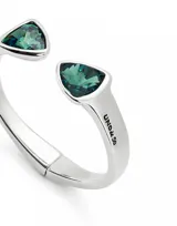 Pulsera rígida plateada con dos cristales facetados triangulares de color verde en los extremos.