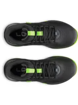 Championes de básquetbol Under Armour modelo Lockdown 7, color negro con detalles en verde neón en la suela y lengüeta. Presentan una parte superior de malla transpirable con superposiciones de cuero sintético y entresuela de EVA para mayor amortiguación.