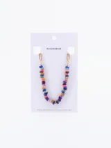 Collar de diseño mixto con una sección de piedras irregulares multicolores y una sección de cadena de eslabones dorados, con cierre de mosquetón y cadena de alargue.