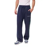 Pantalon de jogging azul marino con franjas laterales en verde y blanco, cintura elástica con cordón ajustable y logo de la marca bordado en la pierna.