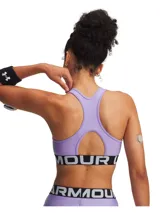 Top deportivo de soporte medio con espalda cruzada y banda elástica inferior con logo de la marca. Confeccionado en tejido HeatGear de secado rápido y alta elasticidad, diseñado para actividades de entrenamiento.