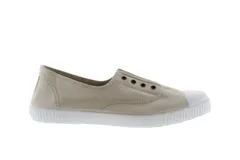 Zapatillas de lona color beige sin cordones, con puntera de goma blanca y suela de caucho vulcanizado.