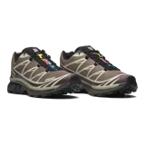 Championes Salomon modelo XT-6 de color negro, diseñados para trail running y uso urbano, con sistema de ajuste rápido Quicklace y suela con gran tracción.