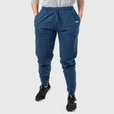 Pantalón deportivo tipo jogging de color azul marino, con cintura elástica ajustable con cordón y puños ajustados en los tobillos. Presenta un pequeño logo bordado en blanco en la parte superior del muslo.