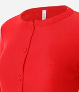 Saco de tricot negro con diseño peplum, cuello redondo, mangas largas y cierre frontal con botones. Presenta un corte ajustado en el torso que se ensancha en la cintura.