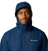 Campera impermeable Columbia modelo Hikebound II Jacket, color azul marino, con capucha ajustable, cierre frontal y bolsillos con cremallera.