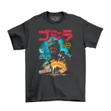 Remera negra de algodón con estampa frontal de Godzilla destruyendo una ciudad, con texto en japonés y frases en inglés.