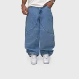 Pantalón jean de corte ultra baggy, tiro medio y diseño holgado en las piernas, confeccionado en denim de algodón en tono celeste claro.