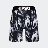 Calzoncillos tipo bóxer de la marca PSD, con estampado de caras de fantasmas sobre fondo negro. Cuenta con pretina elástica negra con el logo de la marca en blanco.