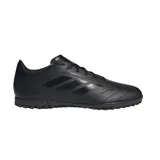 Championes de fútbol Adidas Goletto IX para pasto sintético, color negro con las tres tiras características de la marca en el lateral. Exterior de cuero sintético suave con acolchado y perforaciones. Suela de caucho con taches.