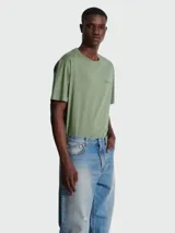 Pantalón de jean Balmain de corte holgado, color azul con efecto desgastado.