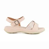 Sandalias bajas color rosa pálido con tiras cruzadas y hebilla lateral.