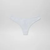 Pack de cinco tangas de algodón con bordes festoneados. El pack incluye tres unidades negras y dos unidades blancas.