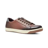 Zapato casual de cuero negro con detalles en marrón en el talón y la lengüeta.