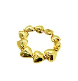 Pulsera elástica con cuentas de corazones dorados de resina.