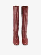 Bota Sontag alta de cuero vacuno negro con tacón de madera y suela de cuero.