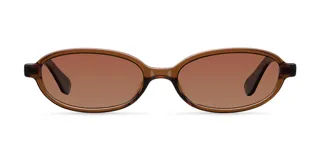 Lentes de sol con montura ovalada de acetato color marrón translúcido (tortoise/carey) y lentes degradados color marrón.