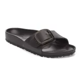 Sandalia tipo chinela Birkenstock modelo Madrid, confeccionada en material EVA ligero y flexible. Presenta una sola tira ancha con una hebilla grande ajustable en tono oscuro y plantilla anatómica moldeada.