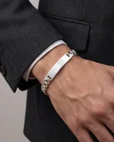 Pulsera de eslabones tipo grumet en plata 925, con chapa central lisa apta para grabado y cierre de mosquetón.