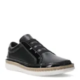 Zapatos casuales de mujer color negro, con diseño tipo slip-on. Presentan una combinación de cuero liso y texturizado con detalles en charol, y una suela con borde de yute trenzado que le otorga un estilo artesanal.