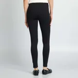 Legging largo negro de punto milano, tiro alto y corte ajustado.