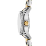 Reloj Michael Kors modelo Lexington de 19 mm con diseño compacto. Presenta una pulsera metálica bicolor en acero inoxidable plateado y dorado, esfera plateada con índices de cristal y número romano en la posición de las 12.