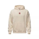 Canguro Jordan Brooklyn Fleece de color beige, con capucha, bolsillo tipo canguro y un pequeño parche gráfico con el logo Jumpman en el centro del pecho.