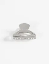 Broche para el pelo plateado, de metal, con forma ovalada.